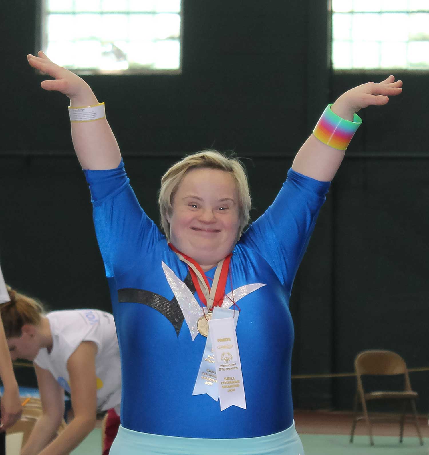Special Olympics Gymnast with Medals