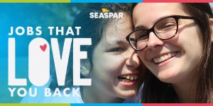 SEASPAR: Jobs that Love You Back. image featuring a SEASPAR participant and staff member embracing.