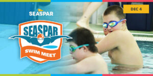Text: SEASPAR Swim Meet Image: Two male teens prepare for a swimming race while submerged in chest-high water.