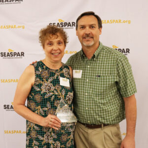 Cheryl and Jason Steed with Award